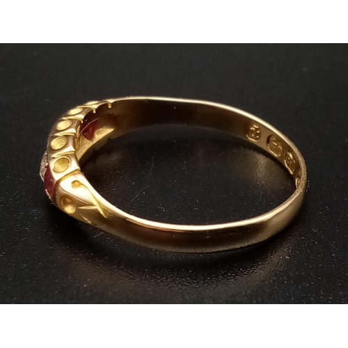 346 - An 18ct yellow gold three rubies and two diamonds ring, size M 1/2, total weight 2.40 grams