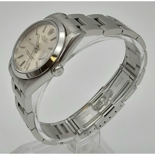 423 - THE MID SIZE ROLEX OYSTER PERPETUAL DATEJUST IN STAINLESS  STEEL , WITH SILVER TONE FACE, VERY GOOD ... 