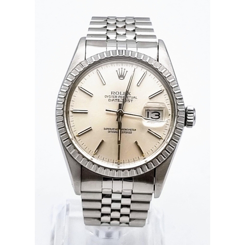 59 - A Rolex Oyster Perpetual Datejust Gents Watch. Stainless steel strap and case - 36mm. Silver tone di... 