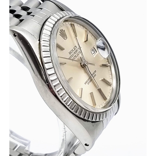 59 - A Rolex Oyster Perpetual Datejust Gents Watch. Stainless steel strap and case - 36mm. Silver tone di... 