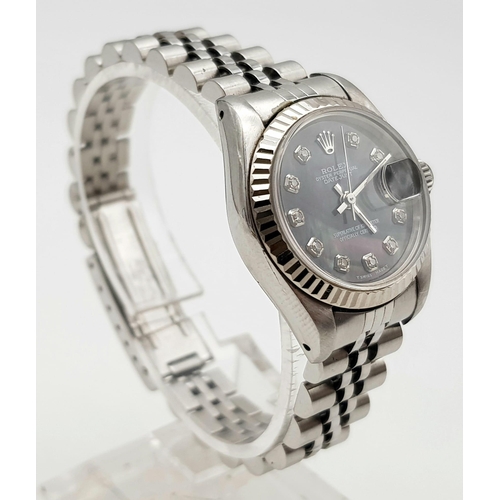 29 - A LADIES ROLEX OYSTER PERPETUAL DATEJUST IN STAINLES STEEL WITH MOTHER  OF PEARL DIAL, DIAMOND NUMER... 