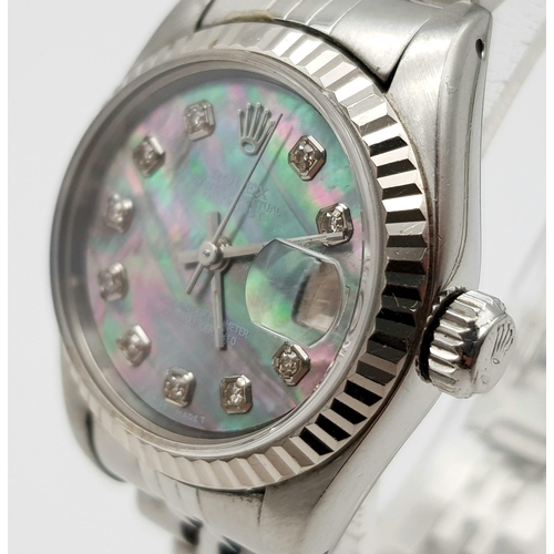 29 - A LADIES ROLEX OYSTER PERPETUAL DATEJUST IN STAINLES STEEL WITH MOTHER  OF PEARL DIAL, DIAMOND NUMER... 