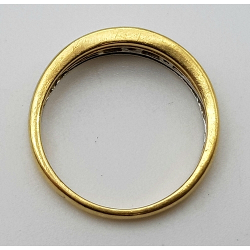 318 - An 18 K yellow gold band ring with diamonds. Size: M, weight: 3.3 g.