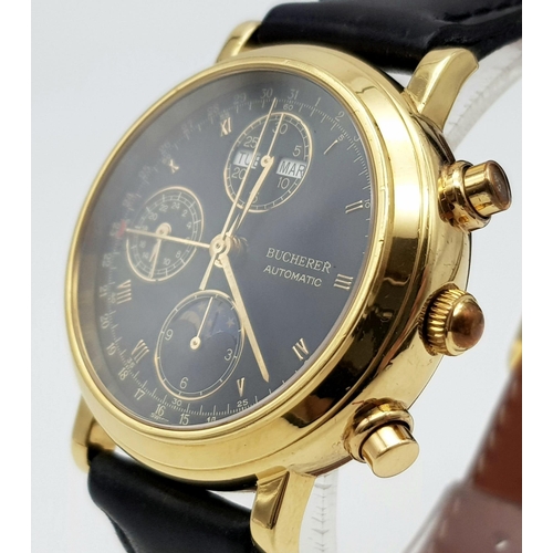 402 - A BUCHERER 18K GOLD MOONPHASE WATCH WITH 3 SUB-DIALS ON A LEATHER STRAP.  38mm