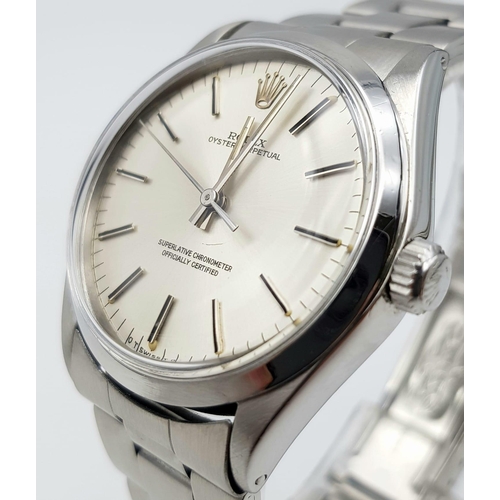 430 - A ROLEX OYSTER PERPETUAL IN STAINLESS STEEL WITH COMPLIMENTARY SILVER TONE DIAL , VERY NICE CONDITIO... 