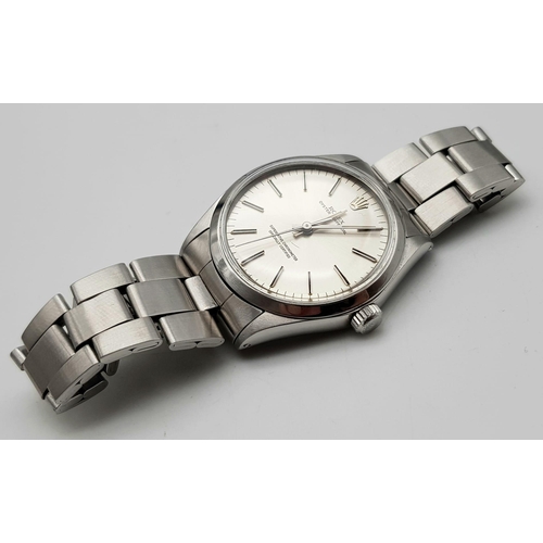 430 - A ROLEX OYSTER PERPETUAL IN STAINLESS STEEL WITH COMPLIMENTARY SILVER TONE DIAL , VERY NICE CONDITIO... 