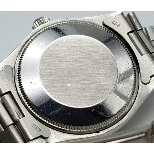 430 - A ROLEX OYSTER PERPETUAL IN STAINLESS STEEL WITH COMPLIMENTARY SILVER TONE DIAL , VERY NICE CONDITIO... 