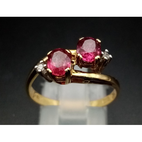 122 - A 9 K yellow gold ring with diamonds and rubies in a twisted design. Ring size: P, weight: 2.6 g.