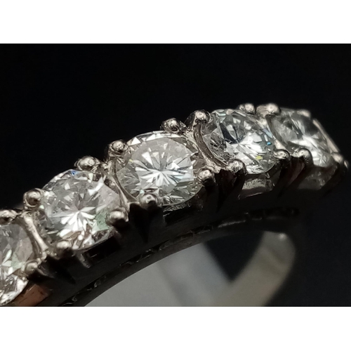 18 - A platinum 800 ring with five diamonds (total 1 carat). Ring size: K, weight: 5.7 g.