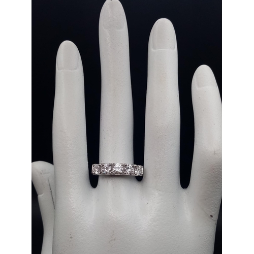 18 - A platinum 800 ring with five diamonds (total 1 carat). Ring size: K, weight: 5.7 g.