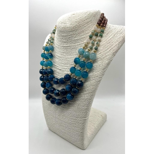 180 - A Three-Row Shades of Blue Faceted Agate Necklace with Multi-Coloured Cultured High Lustre Seed Pear... 