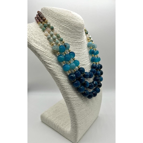 180 - A Three-Row Shades of Blue Faceted Agate Necklace with Multi-Coloured Cultured High Lustre Seed Pear... 