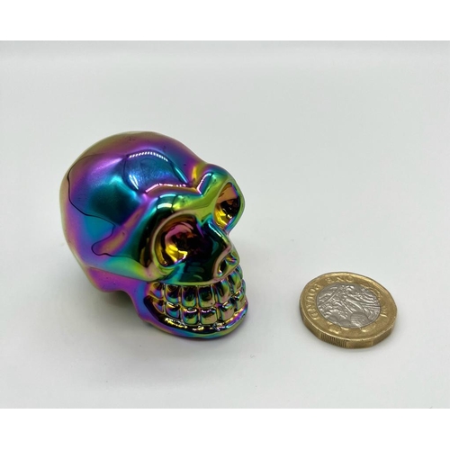 258 - A Chromium-Coloured Quartz Crystal Skull Figure. 5 x 4.5cm.