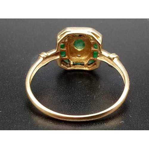 311 - An Art Deco 9 K yellow gold ring with emeralds and diamonds. Ring size: R, weight: 2.1 g.