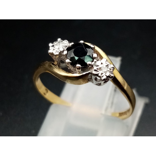 537 - A 9 K yellow gold ring with a sapphire and two diamonds. Ring size: M, weight: 1.7 g.