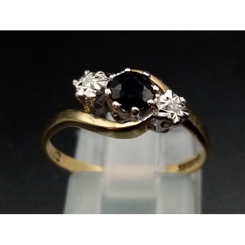 537 - A 9 K yellow gold ring with a sapphire and two diamonds. Ring size: M, weight: 1.7 g.