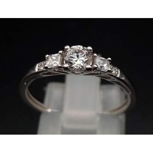 610 - A 9 K white gold , five stone ring. Size: N, weight: 1.4 g.