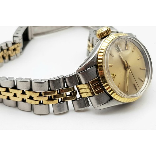 604 - A ROLEX OYSTER PERPETUAL DATE WATCH IN BI-METAL WITH GOLDTONE FACE .  25mm