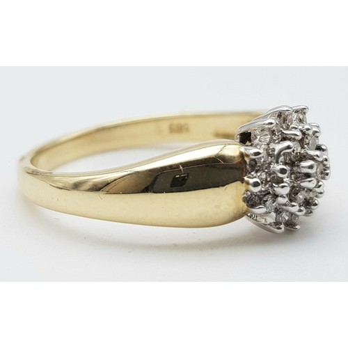 176 - A 14 K yellow gold ring with a cluster of diamonds (0.20 carats). size: K, weight: 2.9 g.