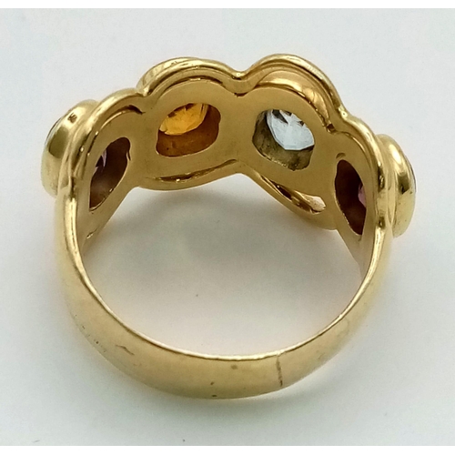 12 - AN 18K YELLOW GOLD DRESS RING WITH 4 DIFFERENT SEMI-PRECIOUS STONES .   12gms  size P