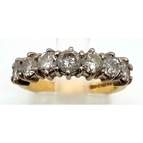 163 - An 18K Yellow Gold Diamond Half-Eternity Ring. Seven stones approx 1ct. Size K. 4.89g total weight. ... 