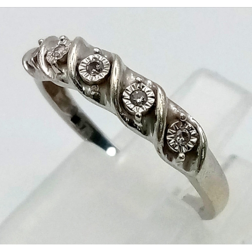 208 - A 9K White Gold Diamond Half-Eternity Ring. Five small round-cut diamonds. Size N. 2.25g.