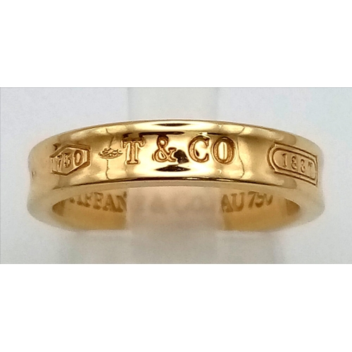 32 - An 18 K yellow gold TIFFANY & CO band ring, size: K, weight: 6.2 g.