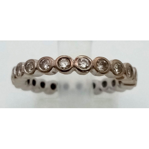 359 - A 950 Platinum Diamond Eternity Ring. Size N. 2.83g total weight.