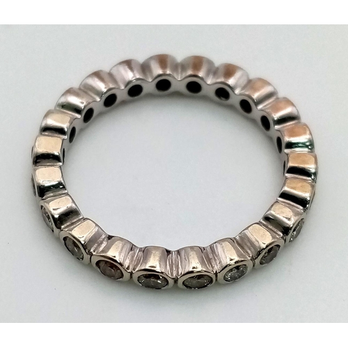 359 - A 950 Platinum Diamond Eternity Ring. Size N. 2.83g total weight.