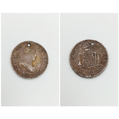 606 - An 1814 Spanish Guatemala One Reale Coin. Please see photos for conditions.