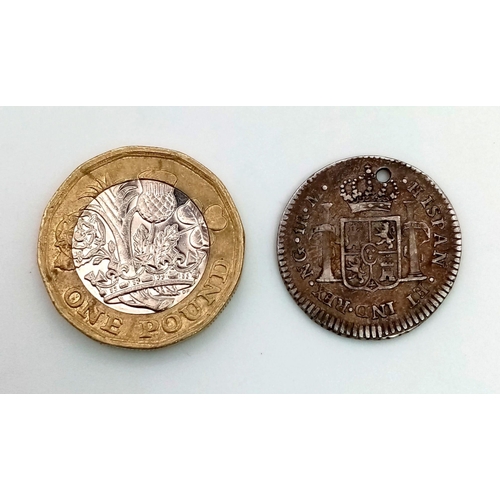 606 - An 1814 Spanish Guatemala One Reale Coin. Please see photos for conditions.