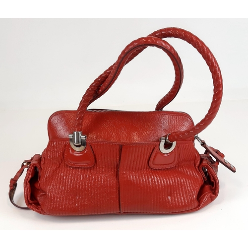 436 - A Chloe Red Shoulder Bag. Red calf leather with silver tone hardware. Two exterior flap pockets with... 