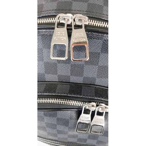 66 - A Louis Vuitton Checked Canvas and Leather Back Pack. Three outer zipped pockets. Excellent conditio... 