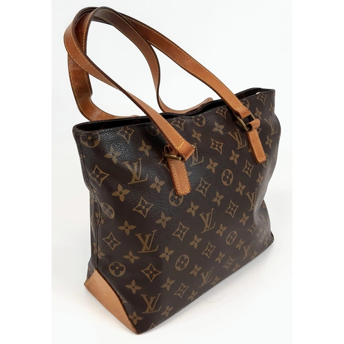 248 - A Louis Vuitton Cabas Piano in Brown Coated Canvas Bag. Leather strap. Cloth interior with zip pocke... 