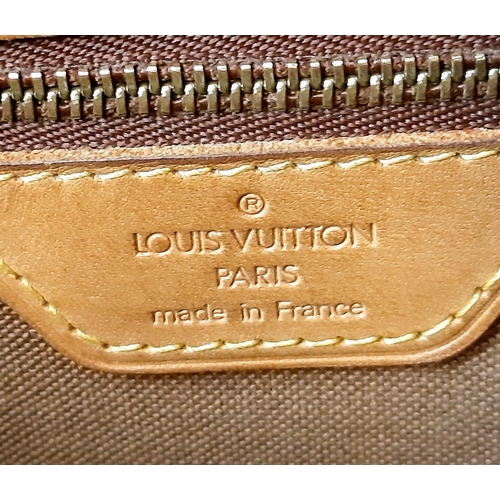 248 - A Louis Vuitton Cabas Piano in Brown Coated Canvas Bag. Leather strap. Cloth interior with zip pocke... 