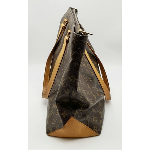 290 - A Brown Monogram Louis Vuitton Coated Canvas Vachetta Cabas Piano Shoulder Bag. Cloth interior with ... 