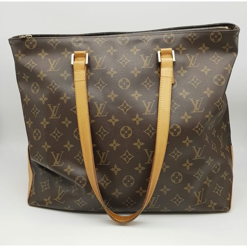 290 - A Brown Monogram Louis Vuitton Coated Canvas Vachetta Cabas Piano Shoulder Bag. Cloth interior with ... 