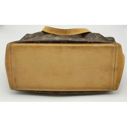 290 - A Brown Monogram Louis Vuitton Coated Canvas Vachetta Cabas Piano Shoulder Bag. Cloth interior with ... 