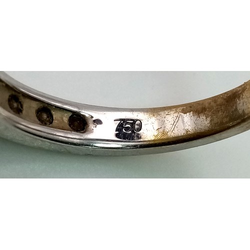 149 - An 18K White Gold Channel-Set Half Eternity Ring. Fifteen diamonds - approx 1ct. Size M. 4.05g. Ref:... 