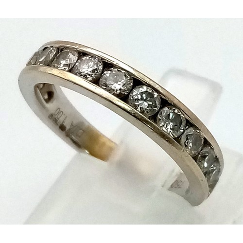 149 - An 18K White Gold Channel-Set Half Eternity Ring. Fifteen diamonds - approx 1ct. Size M. 4.05g. Ref:... 