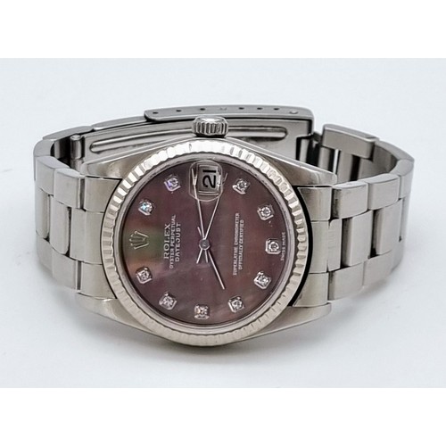 31 - A Rolex Oyster Perpetual Automatic Diamond Ladies Watch. Stainless steel strap and case - 30mm. Moth... 