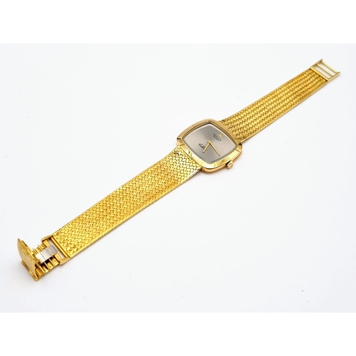 100 - A gents ROLEX CELLINI, solid 18 K yellow gold watch and strap, Case width 30 mm  with smoked grey di... 