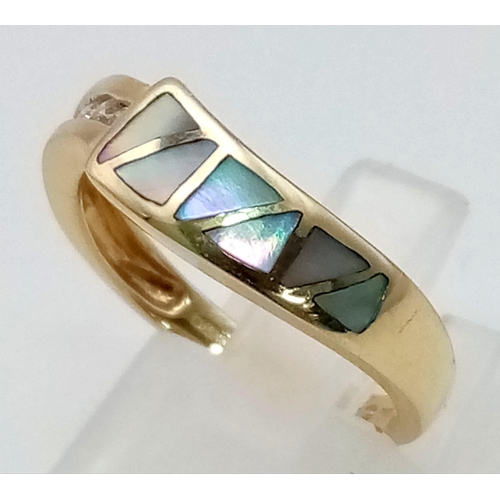 123 - A 14K Yellow Gold Mother of Pearl and Diamond Ring. Six sections of MOP and five diamonds, what a co... 