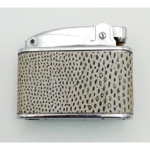 125 - A Vintage Neo Super Lighter with Flash Light. Animal print. 6 x 5cm