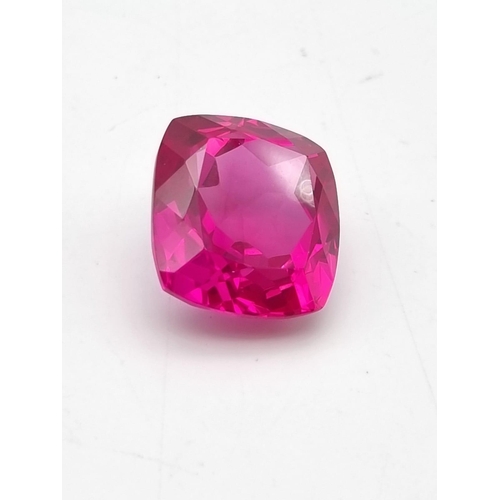 154 - A wonderful, large (50.15 carats), pinkish red Ruby. Cushion cut, flawless, with uniform colouration... 