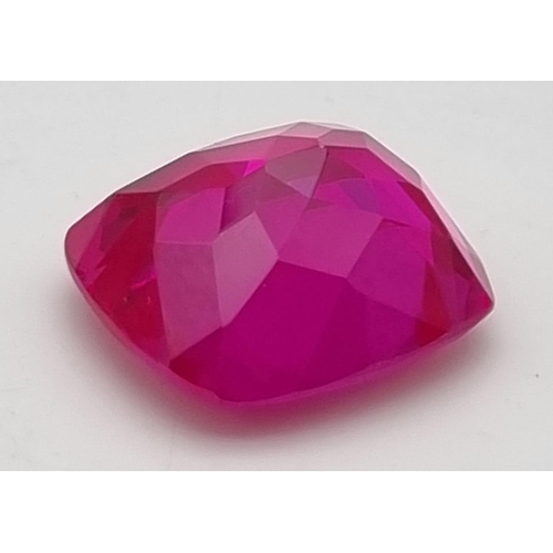 154 - A wonderful, large (50.15 carats), pinkish red Ruby. Cushion cut, flawless, with uniform colouration... 