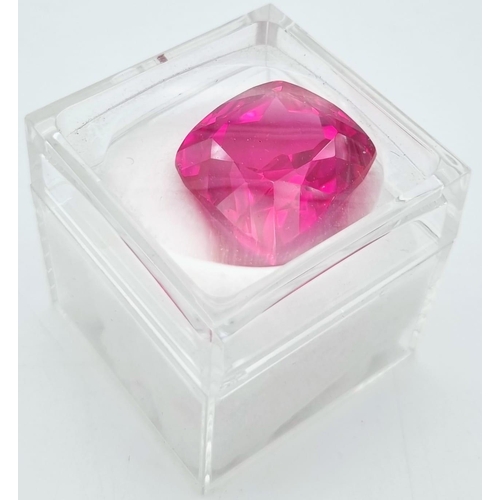 154 - A wonderful, large (50.15 carats), pinkish red Ruby. Cushion cut, flawless, with uniform colouration... 