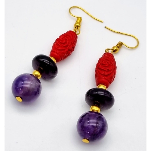 224 - A yellow metal (untested) glamorous, natural amethyst and Chinese cinnabar necklace and earrings set... 