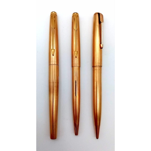 115 - A Vintage Set of Three Gilded Parker Pens: Ballpoint, Fountain and Pencil. Comes in original Parker ... 