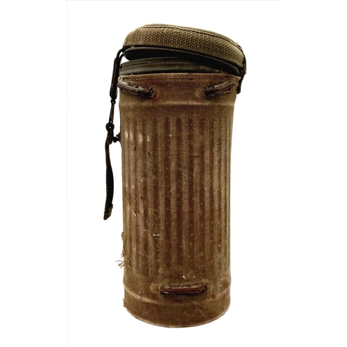 189 - A German WW2 Army Gas Cannister - Complete with cover, gas mask and filter. Cannister 30 x 13cm.